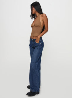 side view of model wearing Princess Polly Everlong Jean Dark Blue Wash Mid Rise 