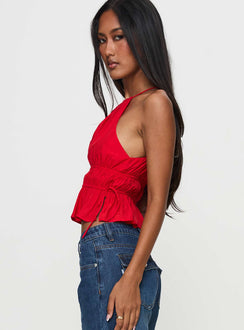 side view of model wearing Princess Polly Rozier Top Red Sleeveless High Neck 