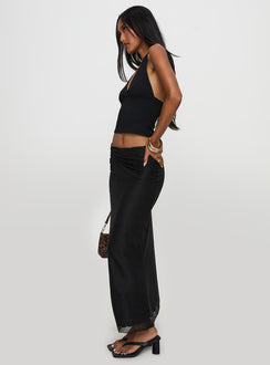   side view of model wearing Princess Polly Satine Maxi Skirt Black Maxi 