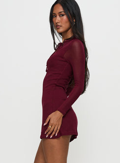 side view of model wearing Princess Polly Primavera Long Sleeve Mini Dress Wine High Neck 