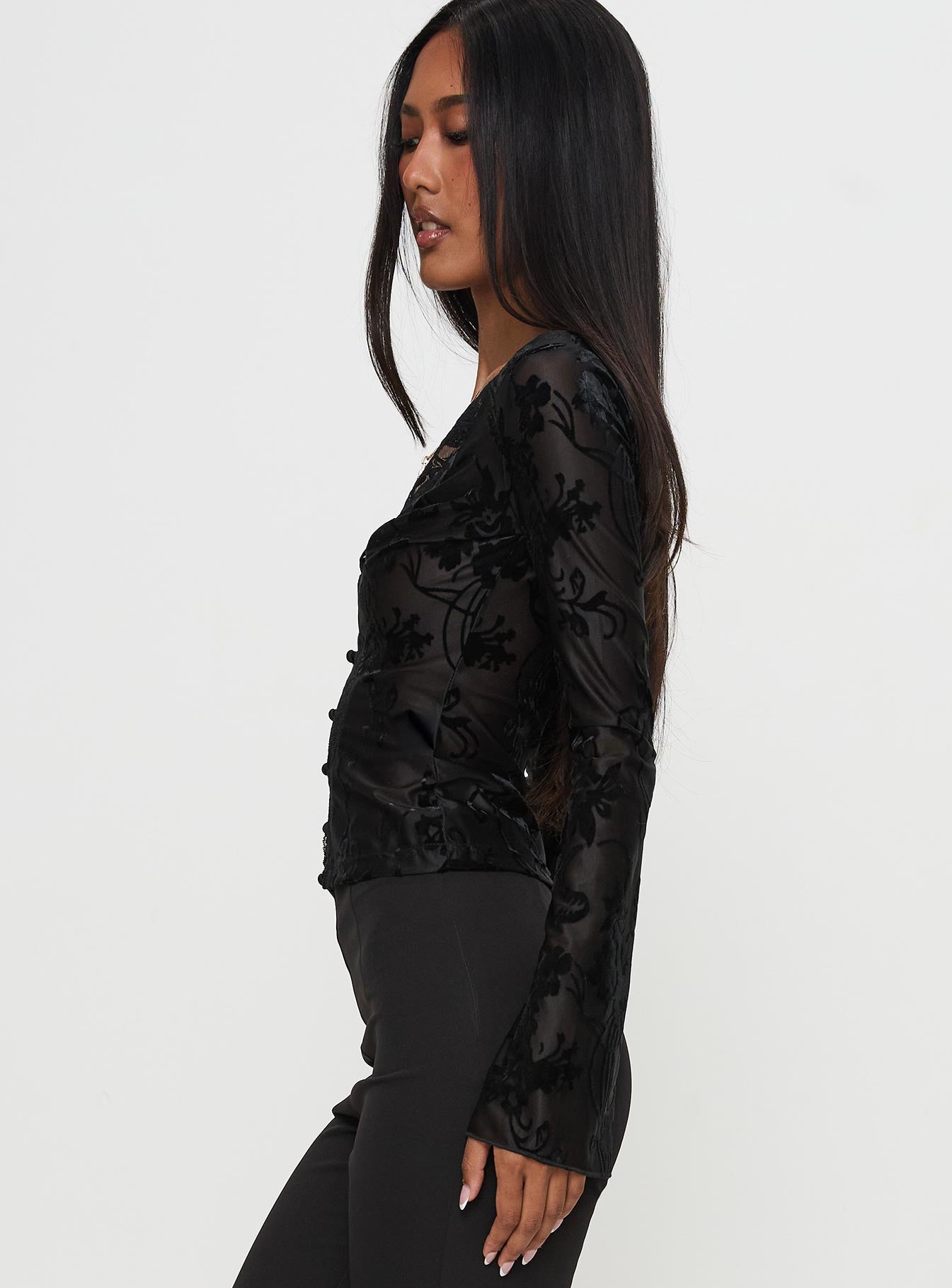 side view of model wearing Princess Polly Find An Angel Long Sleeve Lace Trim Top Black Full Sleeves Plunger 