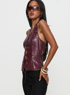 side view of model wearing Princess Polly I've Been There Faux Leather Halter Top Red Sleeveless V-Neck 