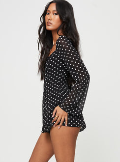 Polka dot romper Square neckline, tie fastening at bust, invisible zip fastening at back Non-stretch material, fully lined