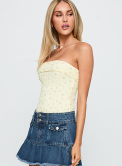 side view of model wearing Princess Polly Majorette Strapless Bodysuit Cream Sleeveless 