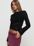 side view of model wearing Princess Polly Sensua Long Sleeve Top Black Full Sleeves High Neck 