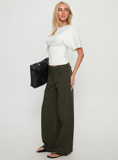 side view of model wearing Princess Polly Jette Tailored Buckle Pant Green Pinstripe High Rise Pants 