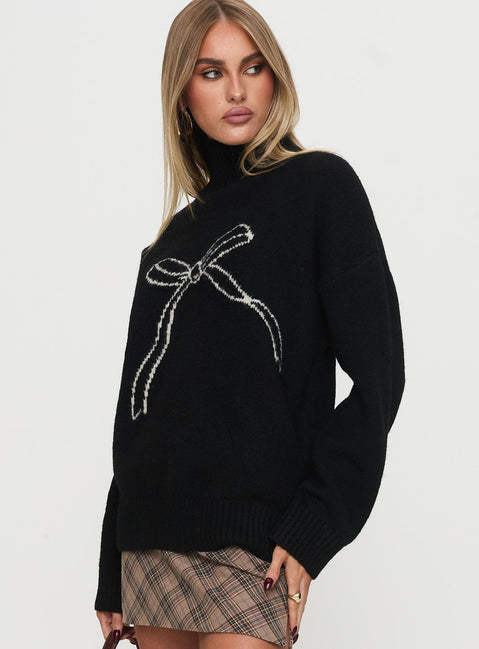 side view of model wearing Princess Polly Shes So Sweet Bow Knit Sweater Black Long 