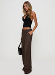 side view of model wearing Princess Polly Cedars Low Rise Pant Brown Stripe Low Rise Pants 