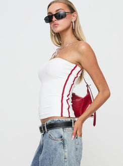 side view of model wearing Princess Polly Simpi Strapless Top White/Red Sleeveless straight 