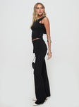 side view of model wearing Princess Polly Shoal Pants Black High Waisted Pants 