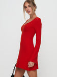 side view of model wearing Princess Polly Best Interest Long Sleeve Mini Dress Red Scoop Neck 