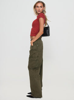 side view of model wearing Princess Polly Ahstin Cargo Jeans Green Low Rise Jeans 