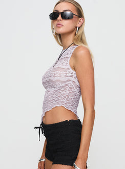 side view of model wearing Princess Polly Tavison Lace Top Pastel Purple Sleeveless Crew Neck 