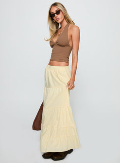   side view of model wearing Princess Polly Garden Party Maxi Skirt Lemon Maxi 