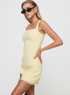 side view of model wearing Princess Polly Allegro Mini Dress Lemon Square Neck 