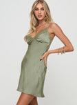 side view of model wearing Princess Polly Lovage Mini Dress Olive Plunger 