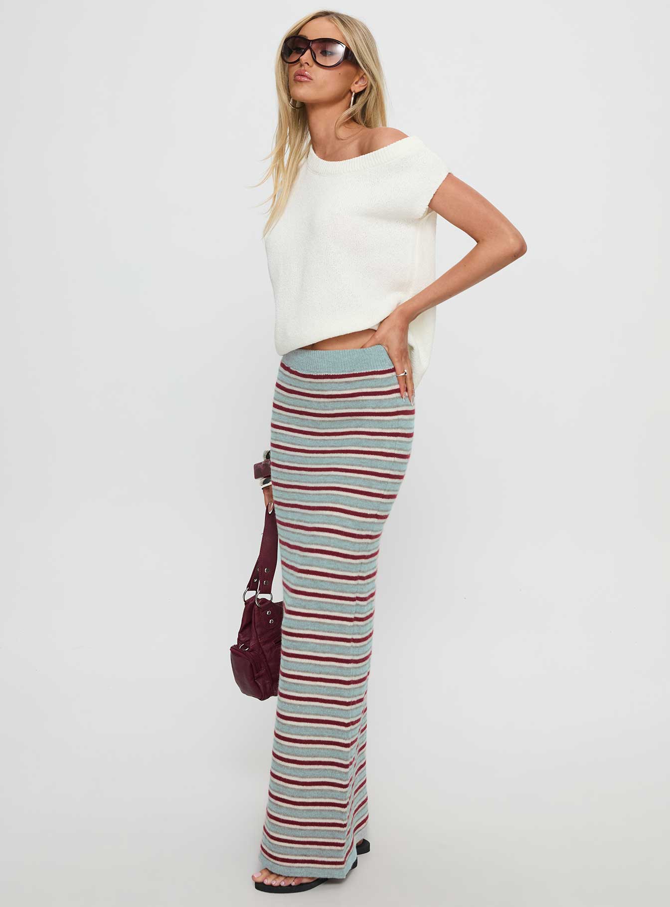   side view of model wearing Princess Polly On Air Knit Maxi Skirt Multi Stripe 