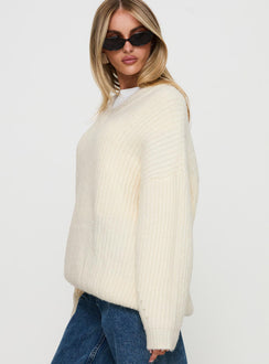 side view of model wearing Princess Polly Have It All V Neck Knit Sweater Cream Long 