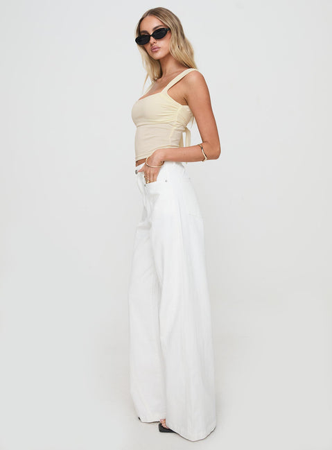 side view of model wearing Princess Polly Cool About It Jeans White High Waisted 