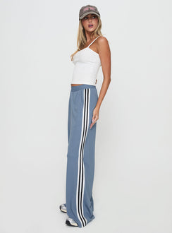 side view of model wearing Princess Polly Dime Track Pants Blue High Waisted Pants 
