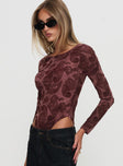 side view of model wearing Princess Polly Spruce Bodysuit Red Paisley Full Sleeves 