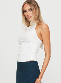 side view of model wearing Princess Polly Merril Halter Top White Sleeveless High Neck 