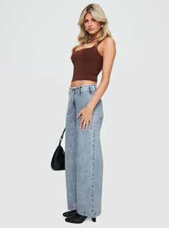 side view of model wearing Princess Polly Thaddeus Jeans Mid Wash Low Rise Jeans 