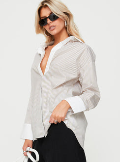 side view of model wearing Princess Polly Only We Know Shirt Beige Full Sleeves V-Neck 