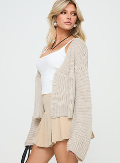 side view of model wearing Princess Polly Artha Cardigan Beige cropped 