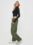 side view of model wearing Princess Polly Verlaine Low Rise Cargo Jeans Olive Mid Rise 