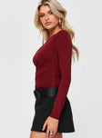 side view of model wearing Princess Polly Donner Long Sleeve Bodysuit Burgundy Full Sleeves Asymmetric Neckline 