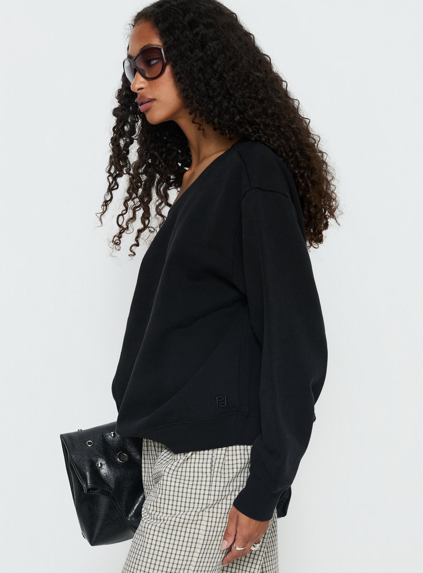 side view of model wearing Princess Polly Wellness Off the Shoulder Jumper Washed Black Longline Jumpers 