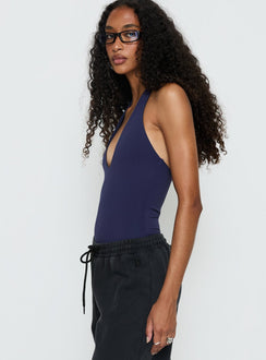 side view of model wearing Princess Polly Someone New Halter Bodysuit Navy Sleeveless 