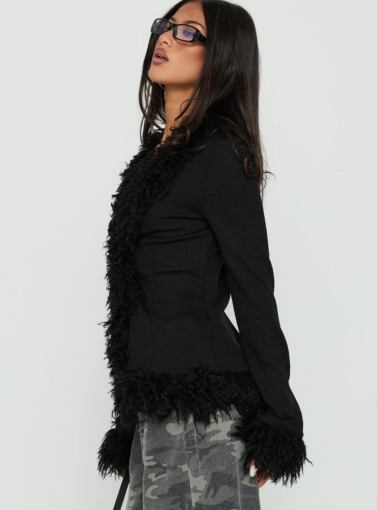 Styled Brynlie Faux Fur Trim Boxy Cardigan in Black womens-jumpers with short length side view of model wearing Princess Polly