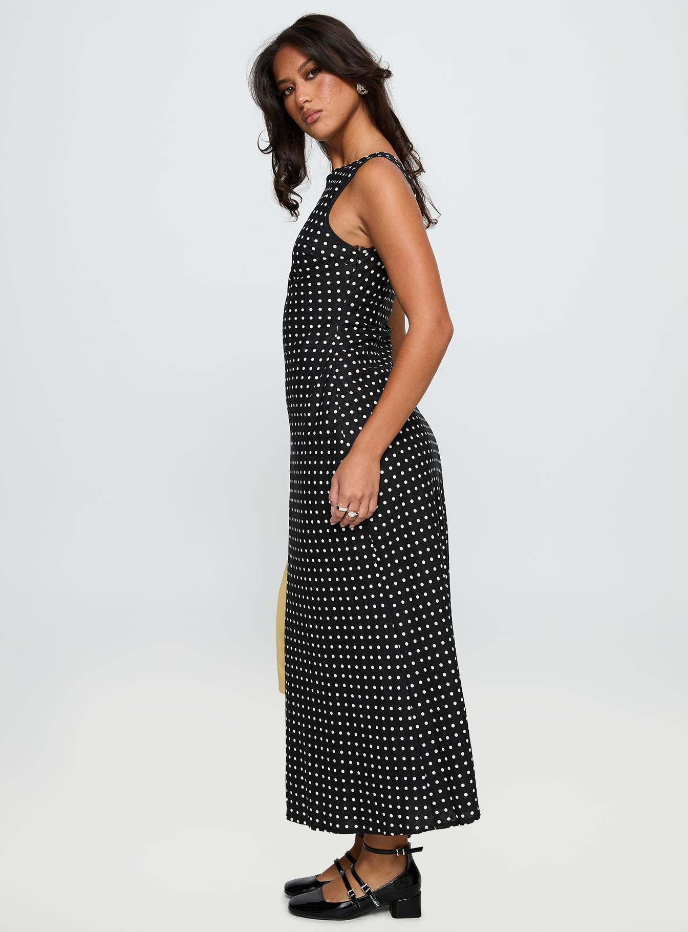 side view of model wearing Princess Polly Voyager Linen Blend Midi Dress Black Polka Crew Neck 