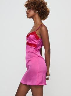 side view of model wearing Princess Polly Idyllic Mini Dress Pink V-Neck 