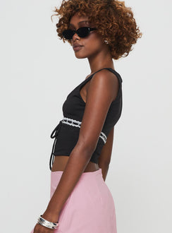 side view of model wearing Princess Polly Mekhi Top Black Sleeveless V-Neck 