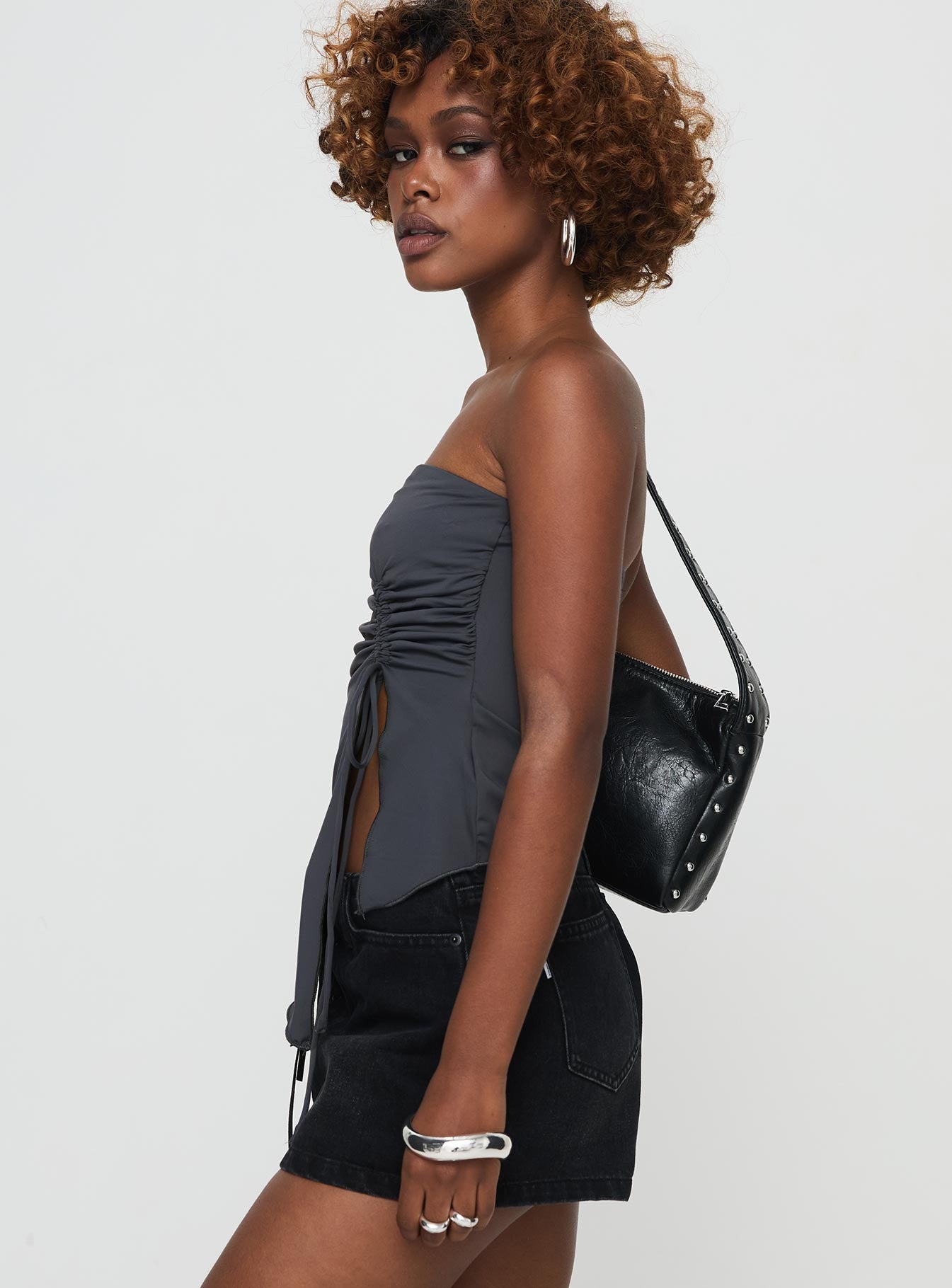 side view of model wearing Princess Polly Dessy Strapless Top Slate Sleeveless straight 