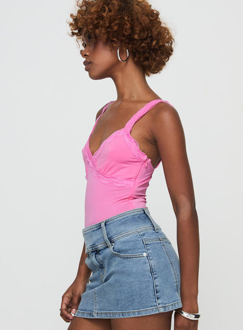 side view of model wearing Princess Polly Girlz Bodysuit Pink Sleeveless V-Neck 