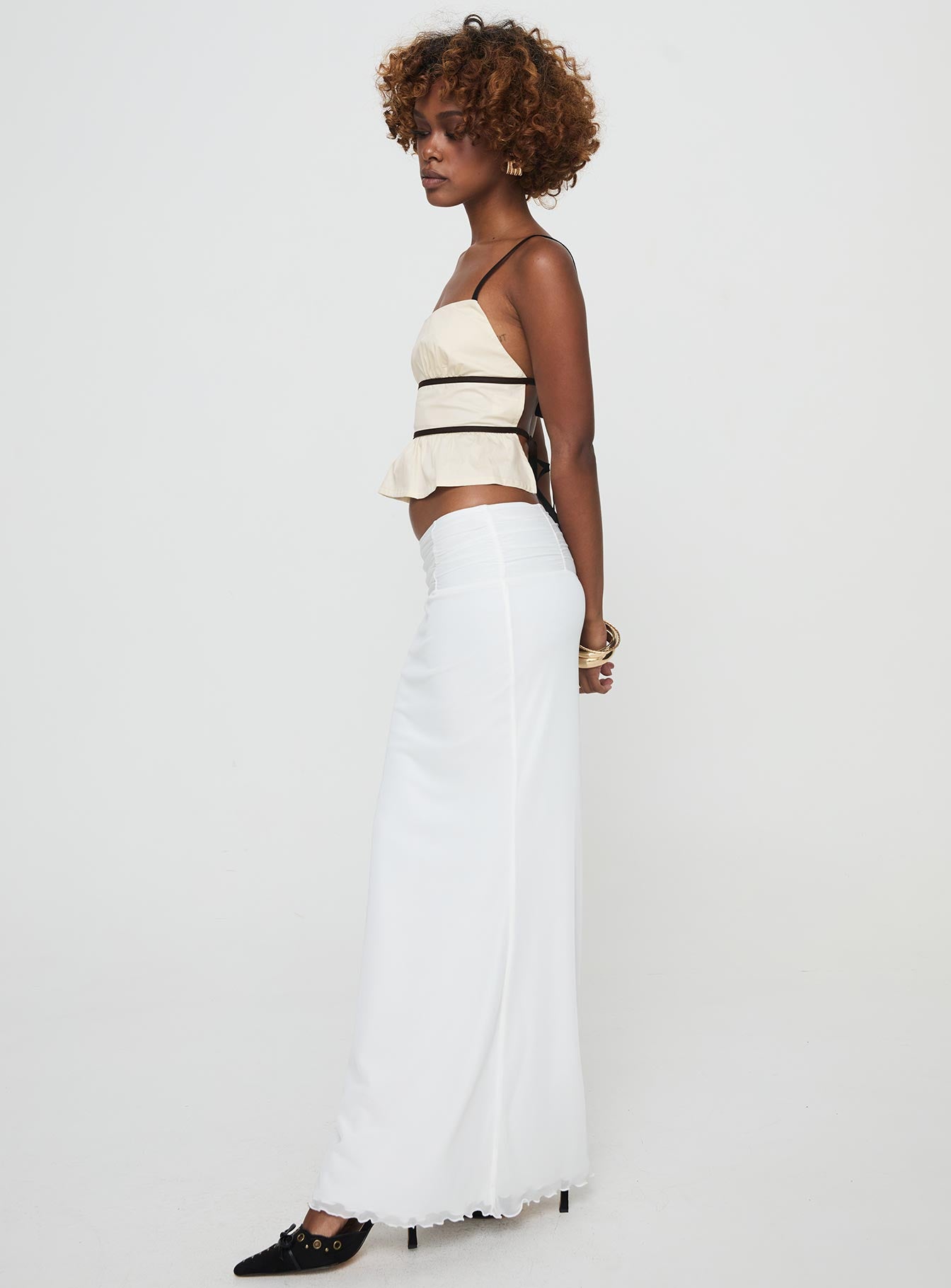  side view of model wearing Princess Polly Meredith Maxi Skirt White Maxi 