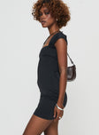 side view of model wearing Princess Polly Marlan Mini Dress Black Square Neck 