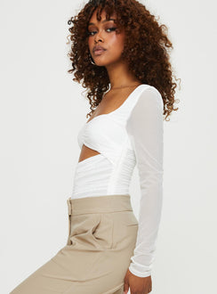 side view of model wearing Princess Polly Kalmia Long Sleeve Bodysuit White Full Sleeves Sweetheart 