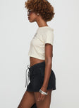 Denim skort Low rise, belt looped waist, lace up fastening, five pockets Non-stretch material, unlined 