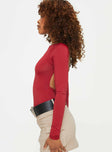 side view of model wearing Princess Polly Gatewood Long Sleeve Bodysuit Burgundy Full Sleeves Boat Neck 