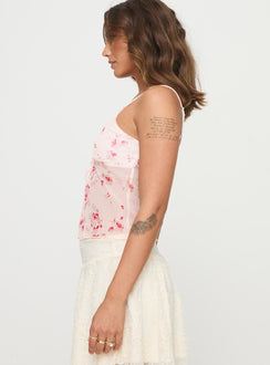 side view of model wearing Princess Polly Emrys Top Beige / Red Floral Sleeveless Scoop Neck 
