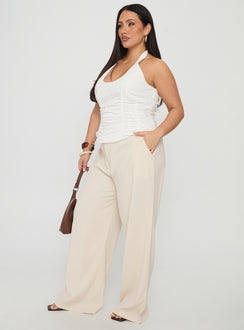 side view of model wearing Princess Polly Irresistible Wide Leg Pant Cream Curve High Waisted Pants 