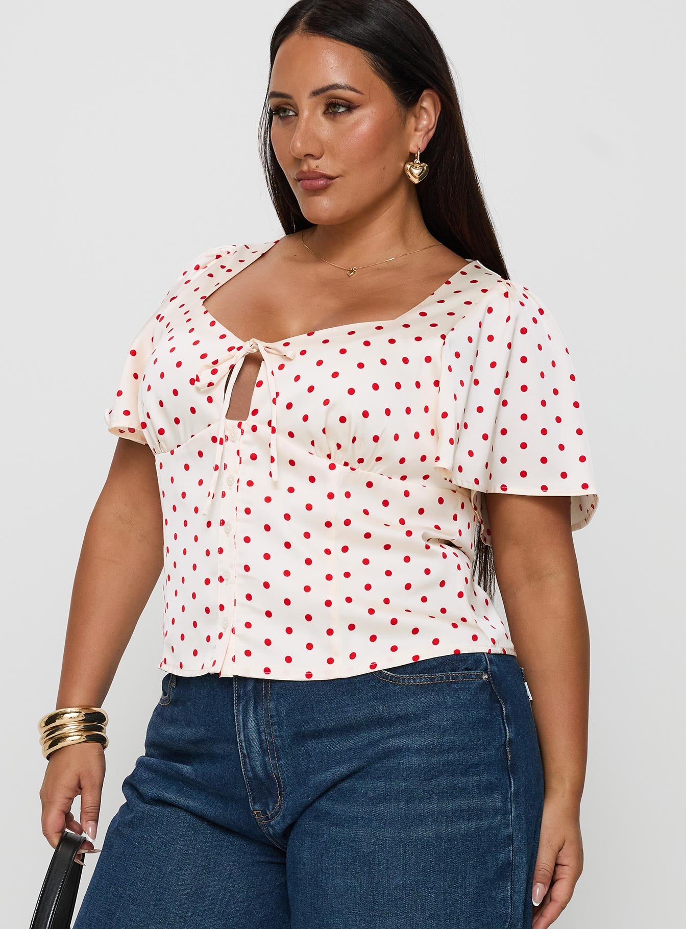 front view of model wearing Princess Polly Adrienna Flutter Blouse White / Red Curve Short Sleeves V-Neck 