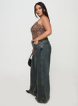 side view of model wearing Princess Polly Ziggie Low Rise Ultra Baggy Jeans Antique Wash Curve High Waisted 