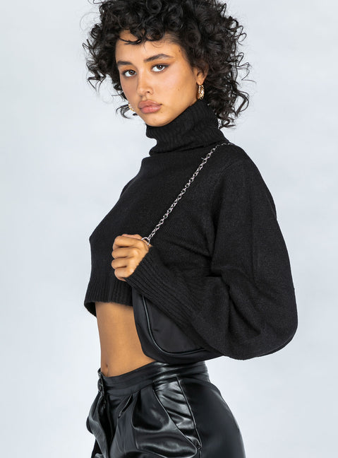 side view of model wearing Princess Polly Zahara Cropped Turtleneck Sweater Black Petite Cropped 