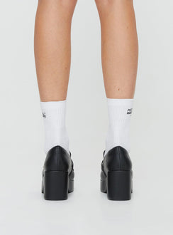 Faux leather platform loafers Slip-on design, padded footbed, treaded sole, rounded toe